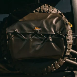 Detailed view of James Baroud Eco Bag effortlessly attached to the tire for ultimate outdoor convenience