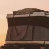 James Baroud Gear Bag on top of Grand Raid Rooftop Tent Open from Olivia Le Ptit Reporter