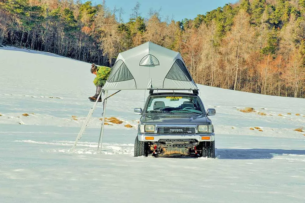 Softshell rooftop tent in snowy conditions